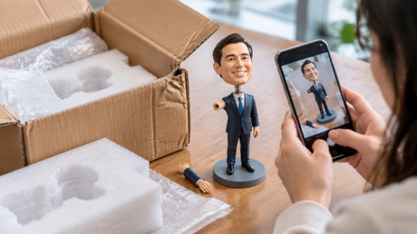 Damaged Custom Bobblehead Delivery Inspection.jpg
